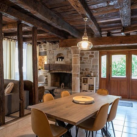 Logis Face A L'Abbatiale Apartment Beaulieu-sur-Dordogne Bagian luar foto