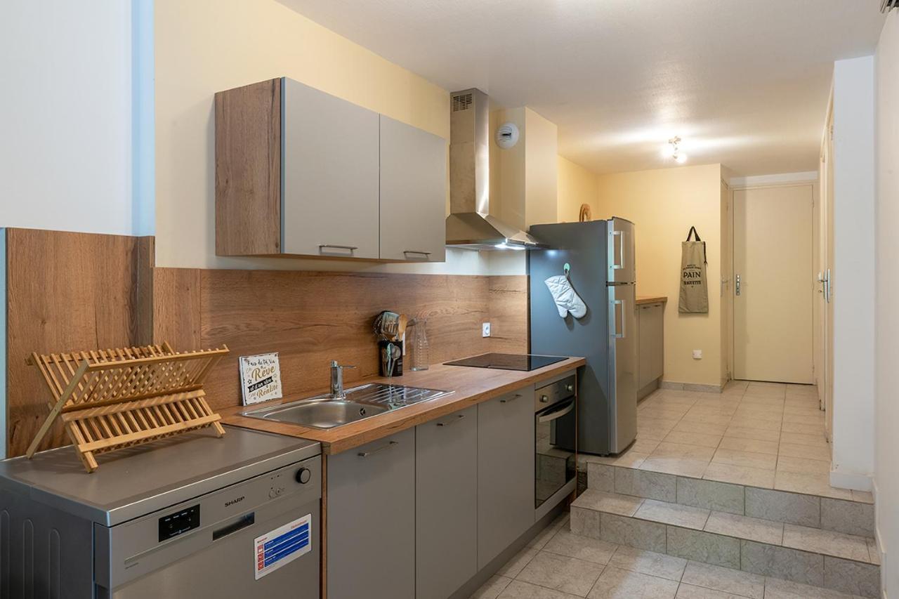 Logis Face A L'Abbatiale Apartment Beaulieu-sur-Dordogne Bagian luar foto